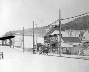 North side of Irving Street at 9th Avenue, where drug store is now, circa 1900